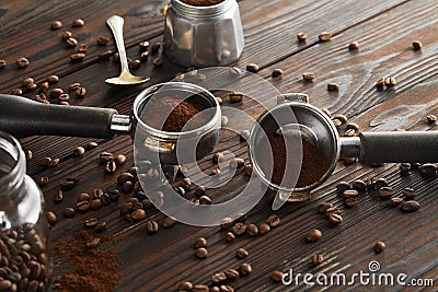 Portafilters near spoon, glass jar and Stock Photo