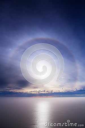 Nearly Circular Rainbow over Pacific Ocean Stock Photo