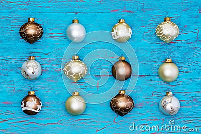 Neat array of metallic Christmas tree ornaments Stock Photo