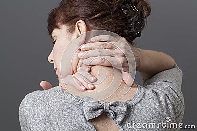 Neck and shoulder gestures for releasing tension Stock Photo