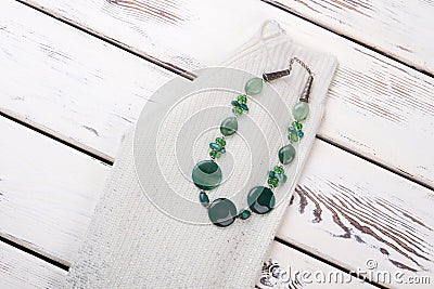 Necklace with green polished stones. Stock Photo