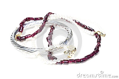 Necklaces, bracelet, diamonds and watch Stock Photo