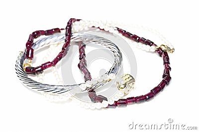 Necklaces, bracelet, diamonds and watch Stock Photo