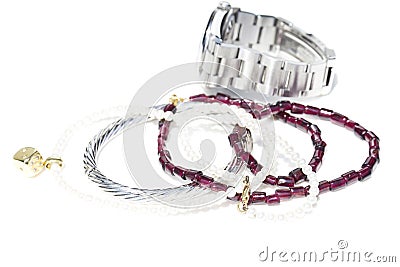 Necklaces, bracelet, diamonds and watch Stock Photo