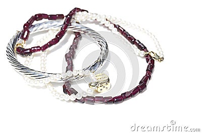 Necklaces, bracelet, diamonds and watch Stock Photo