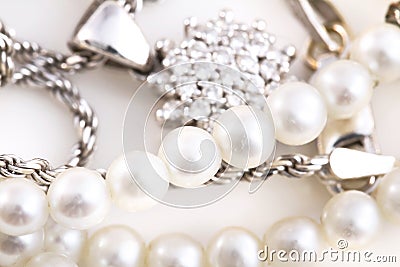 Necklaces, bracelet, diamonds and watch Stock Photo