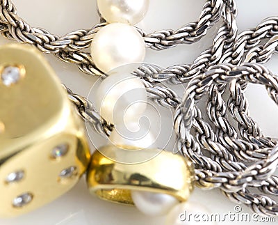 Necklaces, bracelet, diamonds and watch Stock Photo