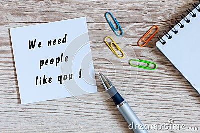 We need people like you written on peace of paper at human resources manager workplace Stock Photo