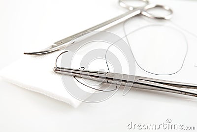 Needle Holders With Suture And Scissors Stock Photo