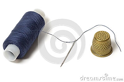 Needle, thread and thimble Stock Photo