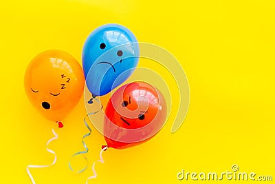 Negative emotions set. Anger depression sleepiness sadness mood painted on colored balloons Stock Photo