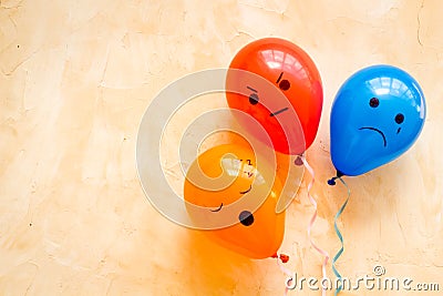 Negative emotions set. Anger depression sleepiness sadness mood painted on colored balloons Stock Photo