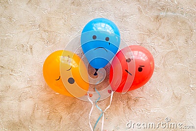 Negative emotions set. Anger depression sleepiness sadness mood painted on colored balloons Stock Photo