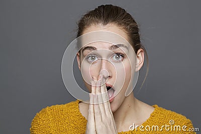 Negative feelings concept for embarrassed 20s girl Stock Photo