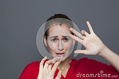 Negative feelings concept for scared 20s girl Stock Photo