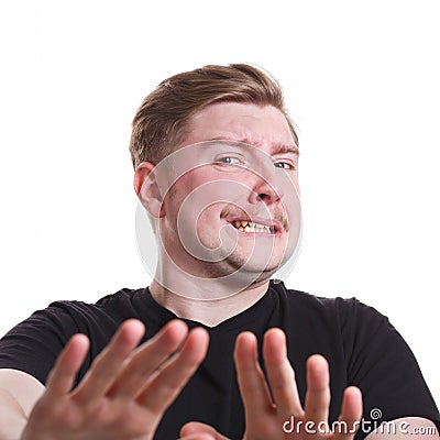 Negative human emotion, man expressing disgust Stock Photo