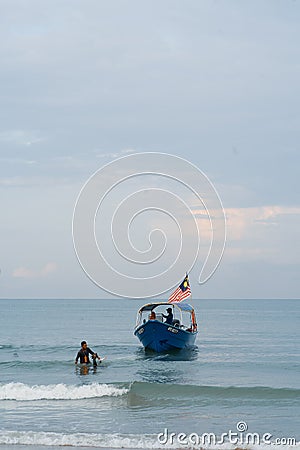 Boatman getting ready for the tourists at Port Dickson Editorial Stock Photo