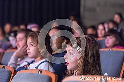 Negev, Beer-Sheva, Israel - Children - the audience in the concert hall with gray chairs Editorial Stock Photo