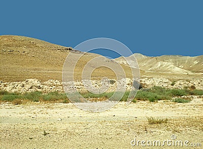 Desert landscape with rocks, hills and mountains Stock Photo