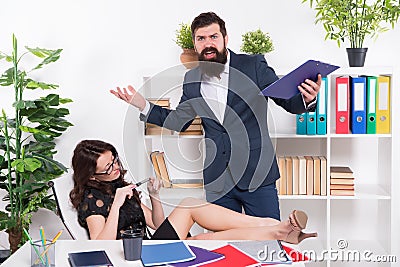 Negligence concept. Stress at work. Lazy sexy girl secretary indifferent. Manager man business report unhappy results Stock Photo