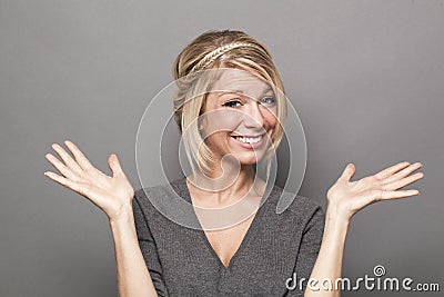 Negligence concept for thrilled young blond woman Stock Photo