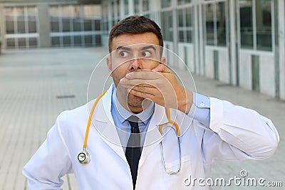 Negligent doctor realising an error Stock Photo