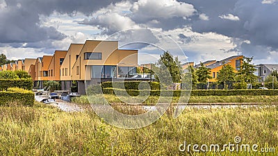 Neighborhood with ecological houses in natural setting Stock Photo