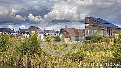 Neighborhood with ecological houses in natural setting Stock Photo