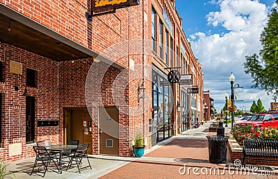 Neighborhood with traditional stores of brick walls. Tulsa, Oklahoma, US Editorial Stock Photo