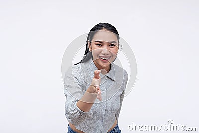 A neighborly young asian woman offers a handshake. A lady befriending someone. Isolated on a white background Stock Photo