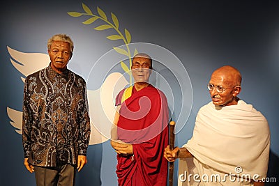 Nelson Mandela, Dalai Lama and Mahatma Gandhi wax statues Editorial Stock Photo