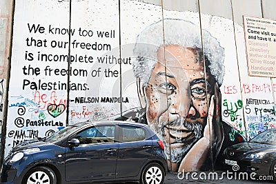 Nelson Mandela graffiti on the Israeli West Bank Editorial Stock Photo