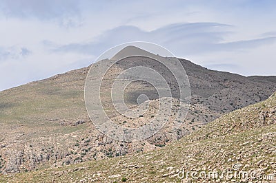 Nemrut Dagi. Mountains on the background of sky. Vertices covered with snow. Stock Photo