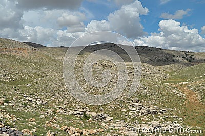 Nemrut Dagi. Mountains on the background of sky. Vertices covered with snow. Stock Photo