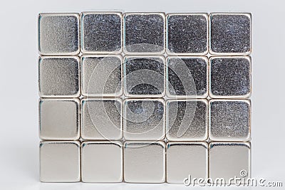 Neodymium magnet cube against white background Stock Photo