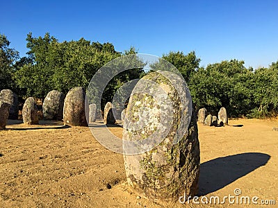 Neolithic European megalith casts long shadow Stock Photo