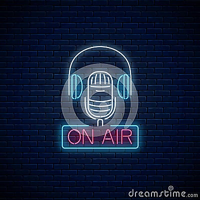 Neon on the air sign with microphone and headphones. Glowing signboard of radio station Vector Illustration