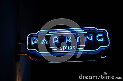 Neon Blue Parking Sign Stock Photo