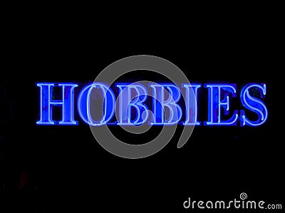 Neon hobbies sign Stock Photo