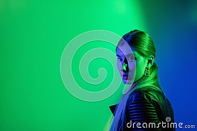 neon light woman advertising background green blue Stock Photo
