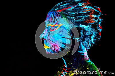 Neon paint creative glowing UV portrait Stock Photo