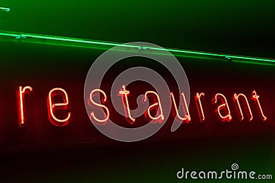 Neon restaurant signboard Stock Photo