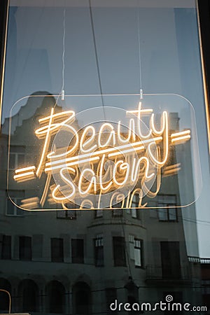 neon sign beauty salon makeup In the window showcase Stock Photo