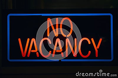 Neon sign reads No Vacancy Stock Photo