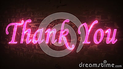 Neon sign text Thank you. Brick wall with the wordsThank you written in bright orange at night. Messages of thanks Stock Photo