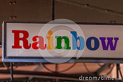 Neon sign with the word rainbow Stock Photo