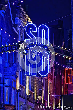 Neon signs for the neighborhood Soho at night London United Kingdom Stock Photo