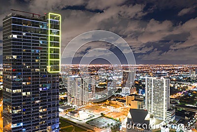 Neon yellow light on a highrise building Downtown Miami FL Editorial Stock Photo