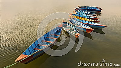 A bunch of colorful Nepal boats in feva lake Pokhara Nepal Stock Photo