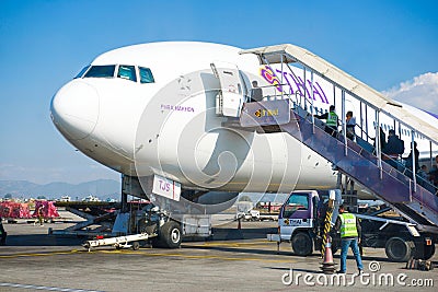 Nepal - 4 January 2017 :: plane of Thai Airways at Kathmandu air Editorial Stock Photo